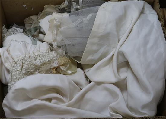 A silk wedding dress and a christening gown